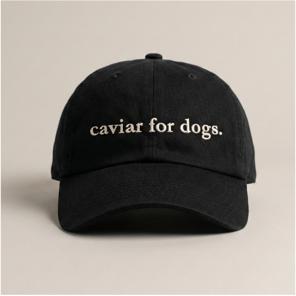 Snarky Barks 'caviar for dogs.' black embroidered dad hat with adjustable snap back, front view