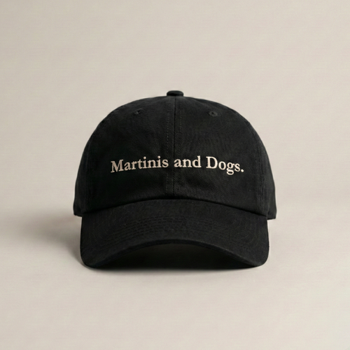 Snarky Barks 'Martinis and Dogs.' black embroidered dad hat, front view